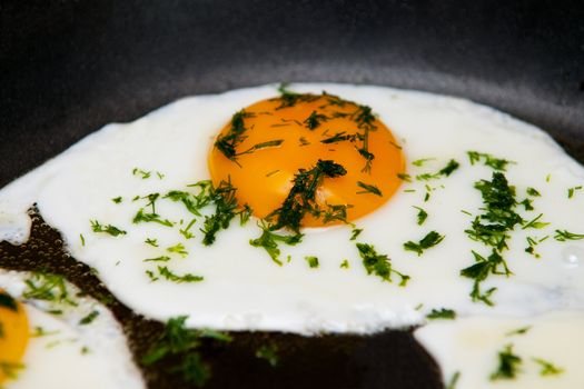 A close up of the fried egg