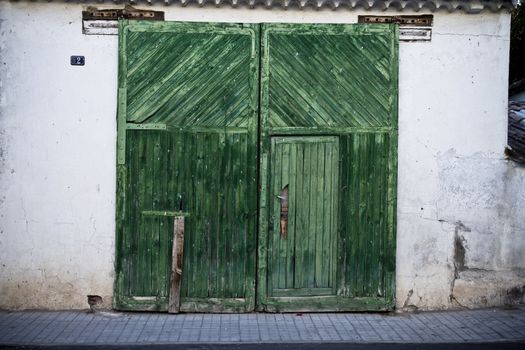 Old door in old street of shops