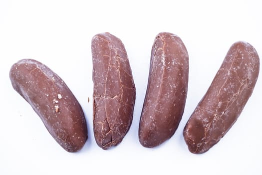 Delicious chocolate pralines over white background.