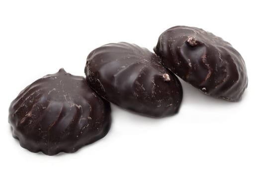 Zephyr in chocolate, three pieces lies on white background inline