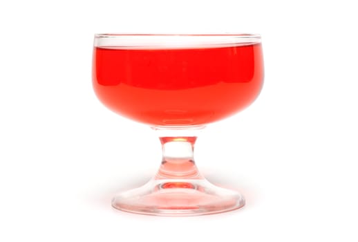 Red jelly in transparent glass, transparent, on white background