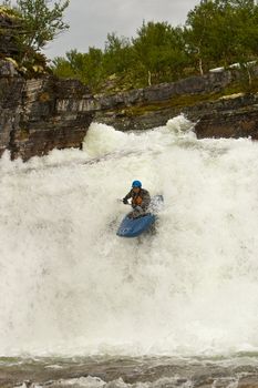 August kayak trip on the waterfalls of Norway