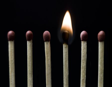 Group of Matches on black background