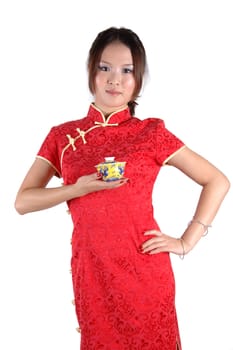 Asian model holding small tea cup. Chinese girl, cute and young model with happy face expression.
