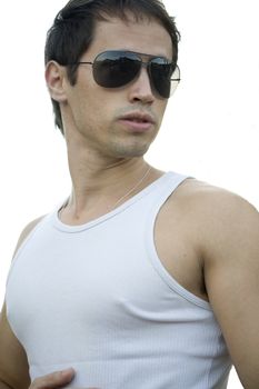 A young male model from Brazil in outdoors photograph,with aviator sunglasses.