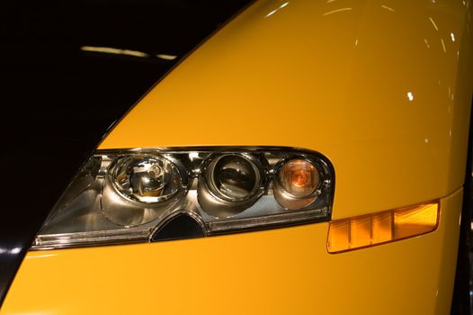 A close up shot (front view) of sportive car