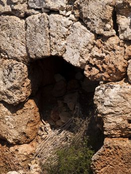 An old and neglected historic Roman wall on the island of Malta