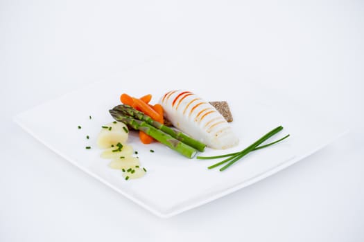 Diet meal, asparagus with carrots and sea food
