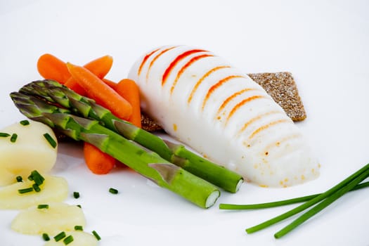 Diet meal, asparagus with carrots and sea food