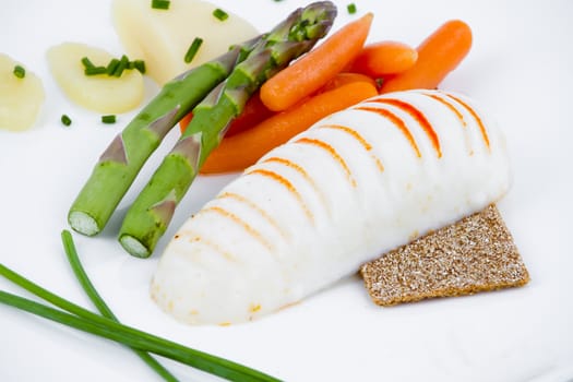 Diet meal, asparagus with carrots and sea food