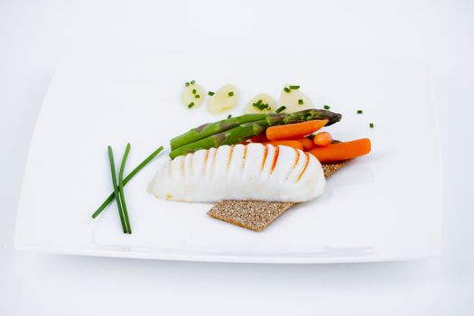 Diet meal, asparagus with carrots and sea food