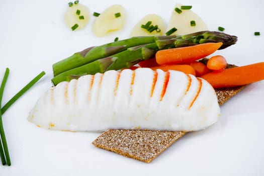 Diet meal, asparagus with carrots and sea food