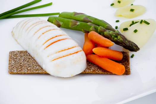 Diet meal, asparagus with carrots and sea food