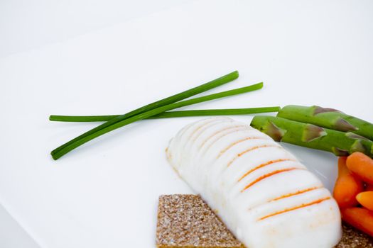 Diet meal, asparagus with carrots and sea food