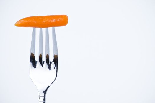 diet, carrot bite in a fork