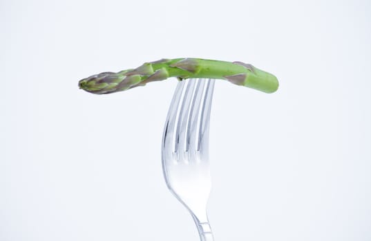 diet, asparagus bite in a fork