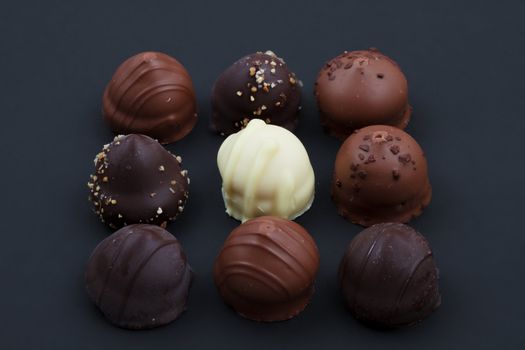 A collection of mixed chocolates and truffles