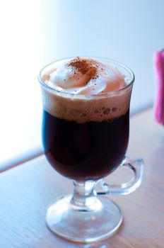 Irish coffee with cream on the top