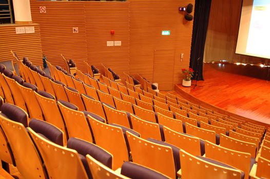 The interior of a theater, the seats and stage