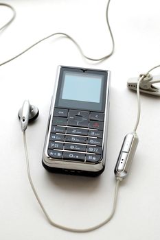 A modern mobile phone and the wired head-phone
