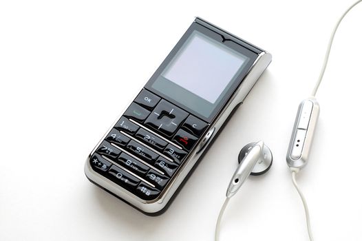 A modern mobile phone and the wired head-phone