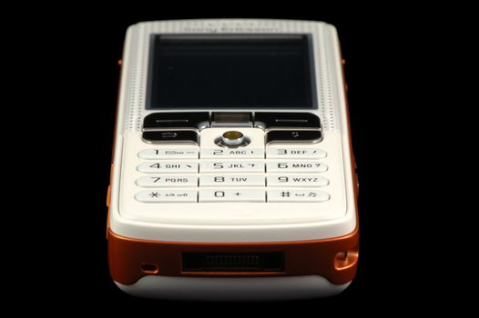 Close up of modern mobile phone over black