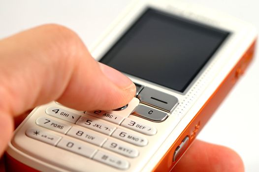 Dialing a modern mobile phone over white