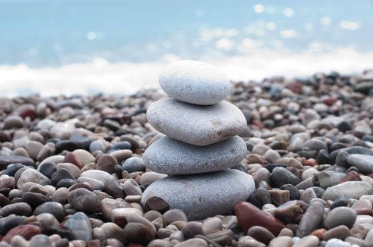 Zen beach stones on the sand