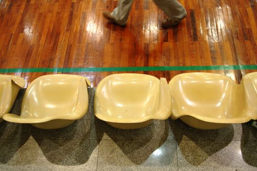 Close up view of line of chairs in stadium