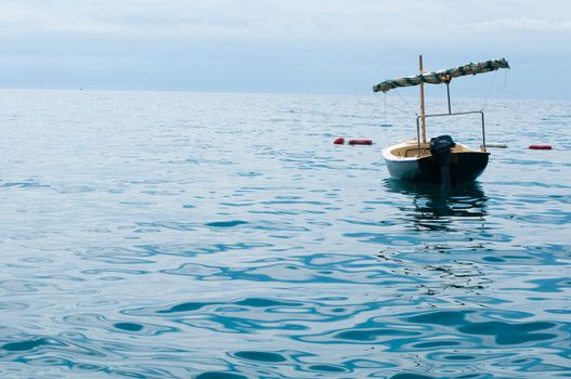 old forgotten boat in water of Adriatic sea