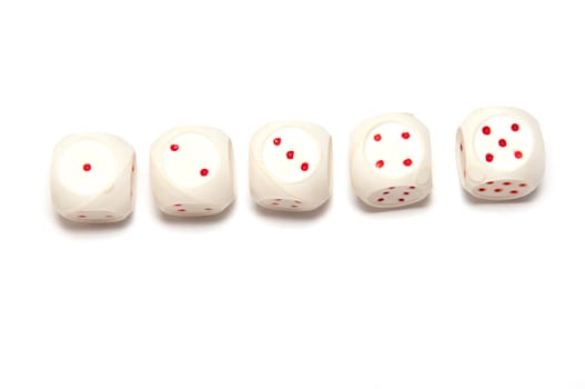 5 white dice with red on white background