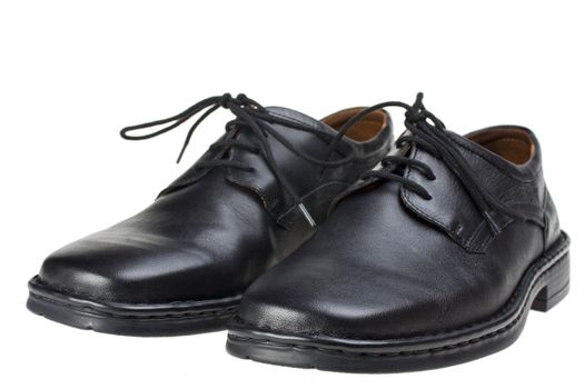 a pair of black leather shoes