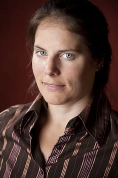 Vertical portrait of an attractive young brunette woman