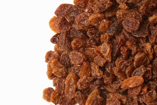 Food background, a heap of raisins with copy space