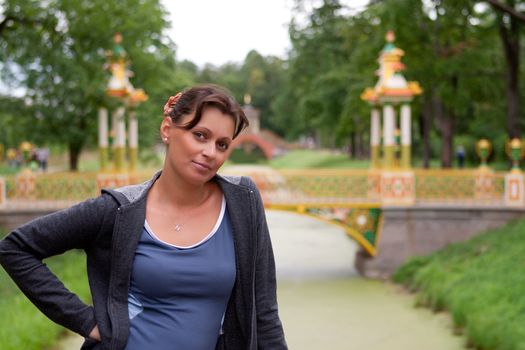 young woman on a chines bridge. St.Petersburg, Russia.