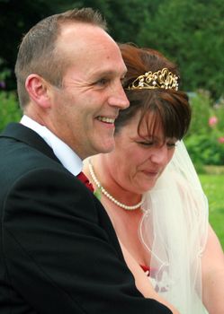 Bride and Groom Smiling after the Wedding