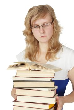 Female student with a pile of books isolated on white background