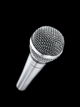 A dynamic microphone over a black background.