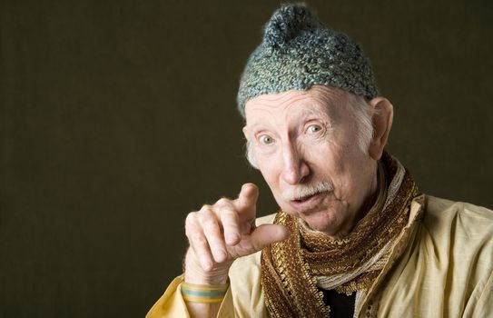 Portrait of wise guru with knit cap