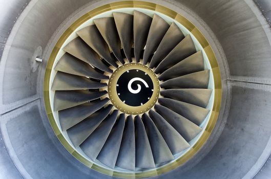 Close up of a turbofan jet engine in modern airliner.