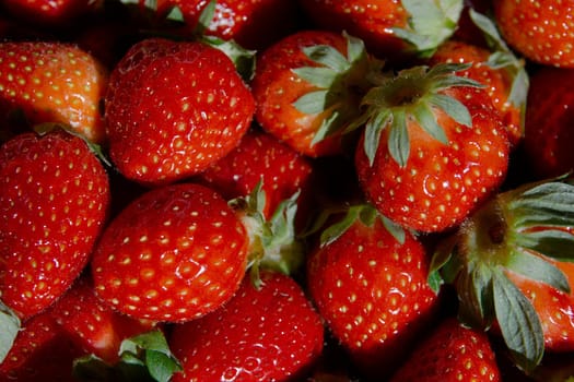 A pile of fresh strawberries