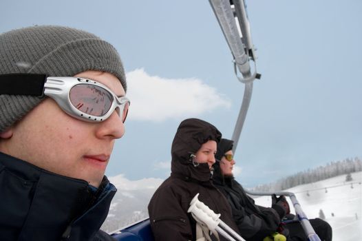 Skiers in the ski lift