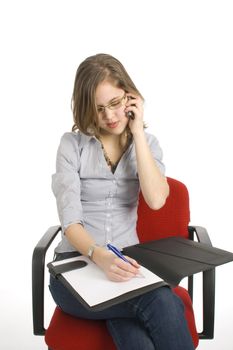 businesswoman talking into a mobile phone on white
