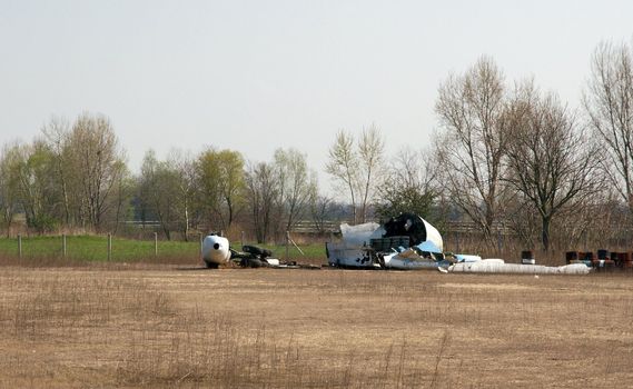 Small old plane wreck on a field