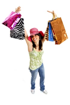 Full body view of young attractive woman going shopping with lots of colorful shopping bags. Isolated on white background.
