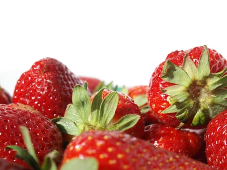 Detail of strawberries isolated over white with copy space