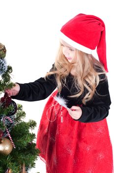 Beautiful baby girl dressed up for Christmas isolated in white