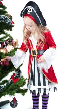 Beautiful baby girl dressed up for Christmas isolated in white