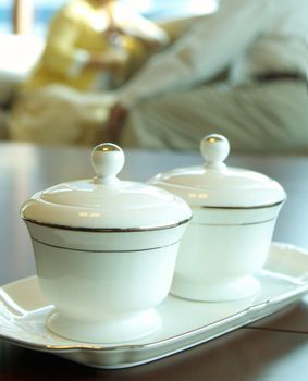 Two tea cups on a tray