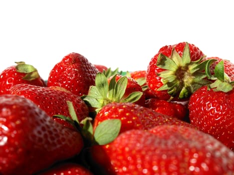 Detail of strawberries isolated over white with copy space